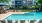 a pool in front of a building