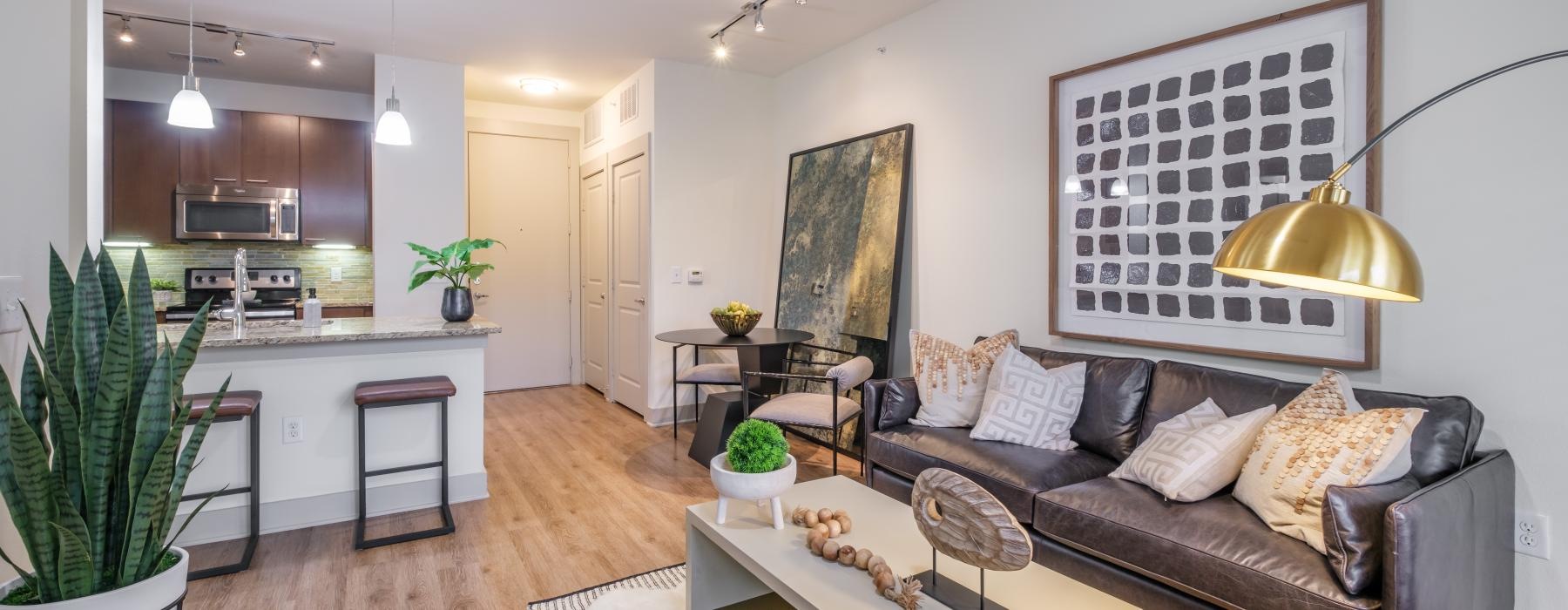 a living room with a couch and a table