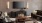 a spacious room with a media area