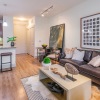 a living room with a couch and a table