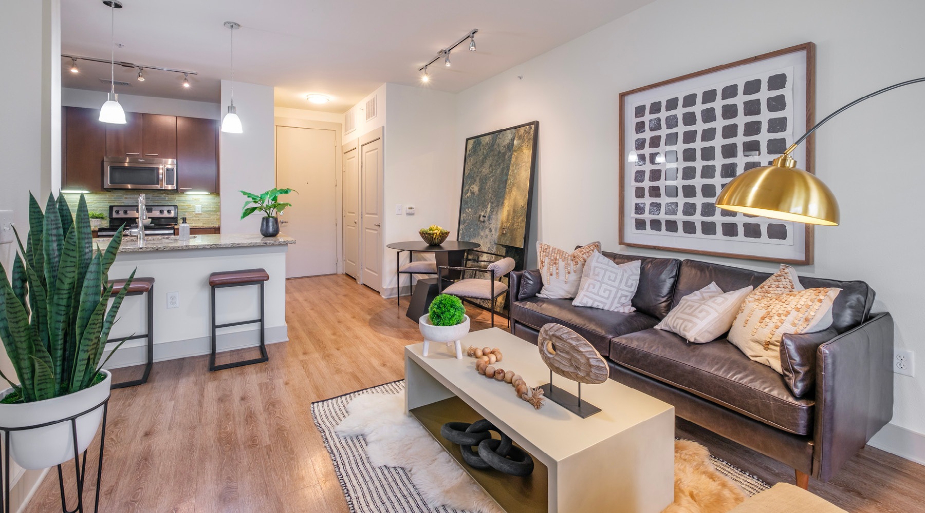 a living room with a couch and a table