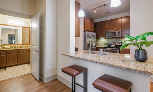 a kitchen with a marble counter top