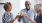 a few people toasting wine glasses